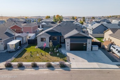 55 Wolf Creek Ln in Gillette WY is situated next to a stunning on Gillette Golf Club in Wyoming - for sale on GolfHomes.com, golf home, golf lot