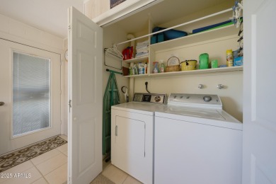 Stop By And View This Expanded Coconino Model Home On Hole on Sun City Lakes West and East in Arizona - for sale on GolfHomes.com, golf home, golf lot