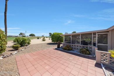Stop By And View This Expanded Coconino Model Home On Hole on Sun City Lakes West and East in Arizona - for sale on GolfHomes.com, golf home, golf lot