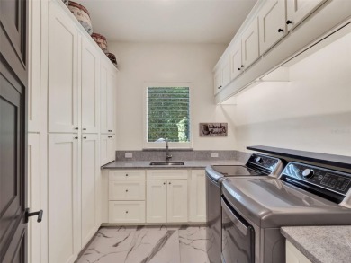 Located behind the private, 24-hour, guarded gates of the on Lake Nona Golf Club, Inc. in Florida - for sale on GolfHomes.com, golf home, golf lot