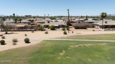 Stop By And View This Expanded Coconino Model Home On Hole on Sun City Lakes West and East in Arizona - for sale on GolfHomes.com, golf home, golf lot
