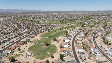 Stop By And View This Expanded Coconino Model Home On Hole on Sun City Lakes West and East in Arizona - for sale on GolfHomes.com, golf home, golf lot