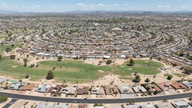Stop By And View This Expanded Coconino Model Home On Hole on Sun City Lakes West and East in Arizona - for sale on GolfHomes.com, golf home, golf lot