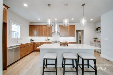 Experience low-maintenance luxury steps from downtown Eagle on Eagle Hills Golf Course in Idaho - for sale on GolfHomes.com, golf home, golf lot