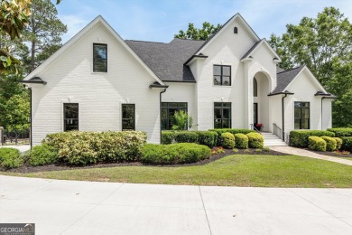 Welcome to luxury living on the largest lot in Riverwood on Champions Retreat Golf Club in Georgia - for sale on GolfHomes.com, golf home, golf lot