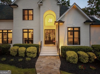 Welcome to luxury living on the largest lot in Riverwood on Champions Retreat Golf Club in Georgia - for sale on GolfHomes.com, golf home, golf lot