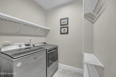 Discover low-maintenance living in this Collington Towns duplex on Cape Fear National At Brunswick Forest in North Carolina - for sale on GolfHomes.com, golf home, golf lot