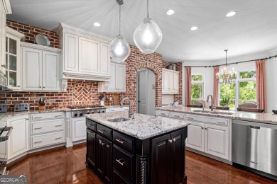 Welcome to luxury living on the largest lot in Riverwood on Champions Retreat Golf Club in Georgia - for sale on GolfHomes.com, golf home, golf lot