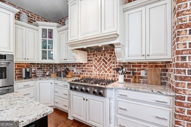 Welcome to luxury living on the largest lot in Riverwood on Champions Retreat Golf Club in Georgia - for sale on GolfHomes.com, golf home, golf lot