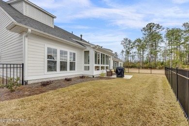 Discover low-maintenance living in this Collington Towns duplex on Cape Fear National At Brunswick Forest in North Carolina - for sale on GolfHomes.com, golf home, golf lot