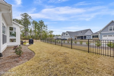 Discover low-maintenance living in this Collington Towns duplex on Cape Fear National At Brunswick Forest in North Carolina - for sale on GolfHomes.com, golf home, golf lot
