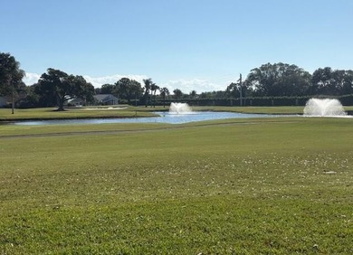 Incredible opportunity! Enjoy beautiful lake views from this on Old Marsh Golf Club in Florida - for sale on GolfHomes.com, golf home, golf lot