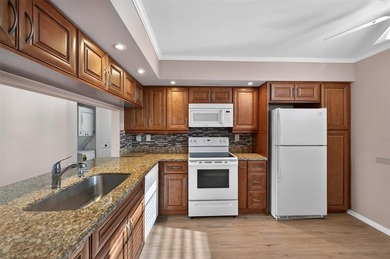 Beautifully updated condo located in the sought-after Sunrise on Sunrise Lakes Phase IV Golf Course in Florida - for sale on GolfHomes.com, golf home, golf lot