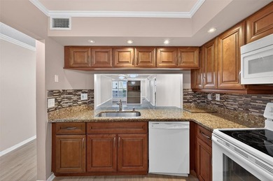 Beautifully updated condo located in the sought-after Sunrise on Sunrise Lakes Phase IV Golf Course in Florida - for sale on GolfHomes.com, golf home, golf lot