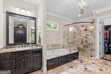 Welcome to luxury living on the largest lot in Riverwood on Champions Retreat Golf Club in Georgia - for sale on GolfHomes.com, golf home, golf lot