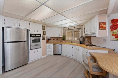 Where can you find a more than reasonably priced manufactured on Palm Desert Greens Country Club in California - for sale on GolfHomes.com, golf home, golf lot