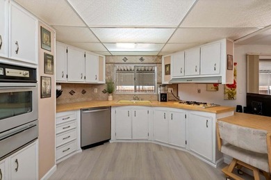 Where can you find a more than reasonably priced manufactured on Palm Desert Greens Country Club in California - for sale on GolfHomes.com, golf home, golf lot