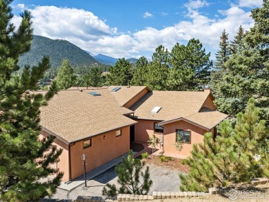 Experience elevated mountain living in this fully remodeled on Lake Estes Golf Course in Colorado - for sale on GolfHomes.com, golf home, golf lot