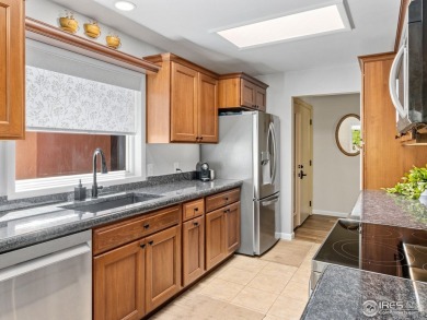 Experience elevated mountain living in this fully remodeled on Lake Estes Golf Course in Colorado - for sale on GolfHomes.com, golf home, golf lot