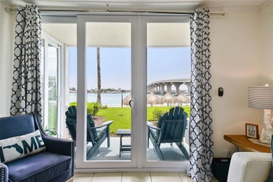 Your tropical waterfront living on Boca Ciega Bay awaits! Escape on Isla Del Sol Yacht and Country Club in Florida - for sale on GolfHomes.com, golf home, golf lot