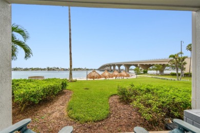 Your tropical waterfront living on Boca Ciega Bay awaits! Escape on Isla Del Sol Yacht and Country Club in Florida - for sale on GolfHomes.com, golf home, golf lot