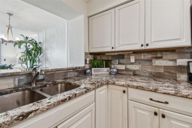 Your tropical waterfront living on Boca Ciega Bay awaits! Escape on Isla Del Sol Yacht and Country Club in Florida - for sale on GolfHomes.com, golf home, golf lot