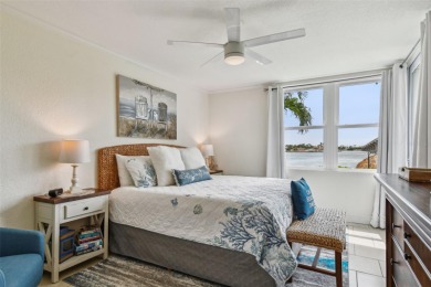 Your tropical waterfront living on Boca Ciega Bay awaits! Escape on Isla Del Sol Yacht and Country Club in Florida - for sale on GolfHomes.com, golf home, golf lot
