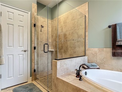 This home has a brand-New Roof! Stunning Panoramic Lake & Golf on Pelican Preserve Golf Club in Florida - for sale on GolfHomes.com, golf home, golf lot