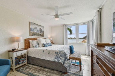 Your tropical waterfront living on Boca Ciega Bay awaits! Escape on Isla Del Sol Yacht and Country Club in Florida - for sale on GolfHomes.com, golf home, golf lot