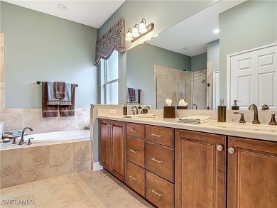 This home has a brand-New Roof! Stunning Panoramic Lake & Golf on Pelican Preserve Golf Club in Florida - for sale on GolfHomes.com, golf home, golf lot