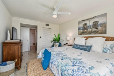 Your tropical waterfront living on Boca Ciega Bay awaits! Escape on Isla Del Sol Yacht and Country Club in Florida - for sale on GolfHomes.com, golf home, golf lot