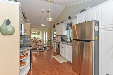 Welcome to your new favorite chapter of life in this charming on Eagle Wood Golf Course in Florida - for sale on GolfHomes.com, golf home, golf lot
