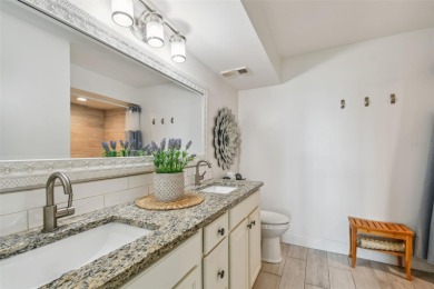 Your tropical waterfront living on Boca Ciega Bay awaits! Escape on Isla Del Sol Yacht and Country Club in Florida - for sale on GolfHomes.com, golf home, golf lot