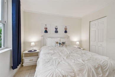 Your tropical waterfront living on Boca Ciega Bay awaits! Escape on Isla Del Sol Yacht and Country Club in Florida - for sale on GolfHomes.com, golf home, golf lot