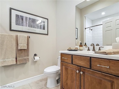 This home has a brand-New Roof! Stunning Panoramic Lake & Golf on Pelican Preserve Golf Club in Florida - for sale on GolfHomes.com, golf home, golf lot