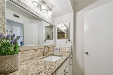 Your tropical waterfront living on Boca Ciega Bay awaits! Escape on Isla Del Sol Yacht and Country Club in Florida - for sale on GolfHomes.com, golf home, golf lot