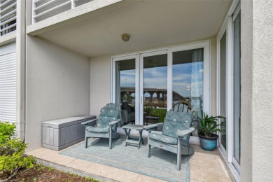 Your tropical waterfront living on Boca Ciega Bay awaits! Escape on Isla Del Sol Yacht and Country Club in Florida - for sale on GolfHomes.com, golf home, golf lot