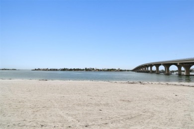 Your tropical waterfront living on Boca Ciega Bay awaits! Escape on Isla Del Sol Yacht and Country Club in Florida - for sale on GolfHomes.com, golf home, golf lot