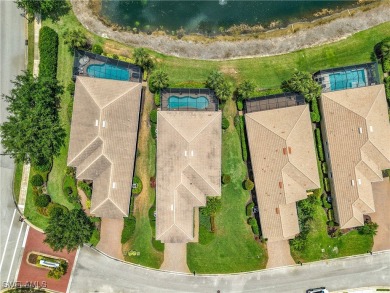 This home has a brand-New Roof! Stunning Panoramic Lake & Golf on Pelican Preserve Golf Club in Florida - for sale on GolfHomes.com, golf home, golf lot