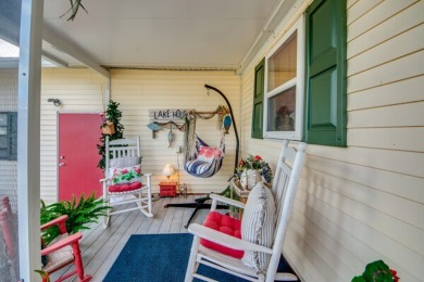 This great two-bed, two-bath home is located on the course at on Pine Lakes Country Club in Florida - for sale on GolfHomes.com, golf home, golf lot
