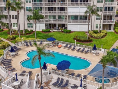 Your tropical waterfront living on Boca Ciega Bay awaits! Escape on Isla Del Sol Yacht and Country Club in Florida - for sale on GolfHomes.com, golf home, golf lot