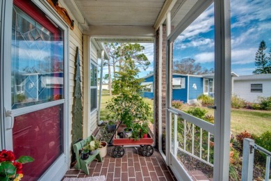 This great two-bed, two-bath home is located on the course at on Pine Lakes Country Club in Florida - for sale on GolfHomes.com, golf home, golf lot