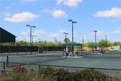 This home has a brand-New Roof! Stunning Panoramic Lake & Golf on Pelican Preserve Golf Club in Florida - for sale on GolfHomes.com, golf home, golf lot