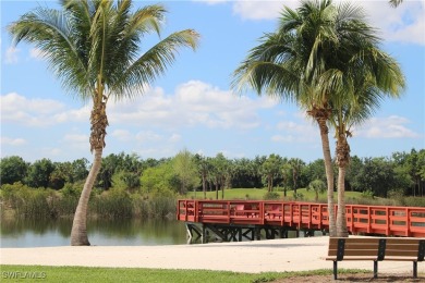 This home has a brand-New Roof! Stunning Panoramic Lake & Golf on Pelican Preserve Golf Club in Florida - for sale on GolfHomes.com, golf home, golf lot