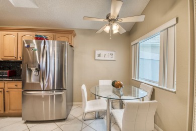 Discover this stunning 3-bedroom, 2-bathroom single-story home on PGA National Golf Club in Florida - for sale on GolfHomes.com, golf home, golf lot