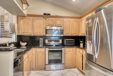 Discover this stunning 3-bedroom, 2-bathroom single-story home on PGA National Golf Club in Florida - for sale on GolfHomes.com, golf home, golf lot