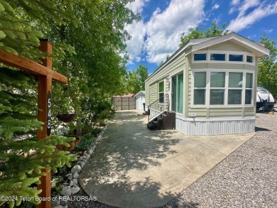 Beautifully maintained like-new, immaculate 2022 CAVCO unit in on Star Valley RV Golf Course in Wyoming - for sale on GolfHomes.com, golf home, golf lot