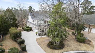 Located on a quiet cul-de-sac and overlooking the marsh is a on Carolina National Golf Club in North Carolina - for sale on GolfHomes.com, golf home, golf lot