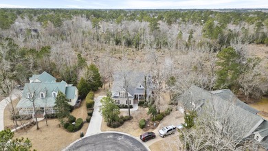 Located on a quiet cul-de-sac and overlooking the marsh is a on Carolina National Golf Club in North Carolina - for sale on GolfHomes.com, golf home, golf lot