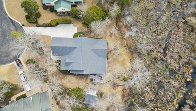Located on a quiet cul-de-sac and overlooking the marsh is a on Carolina National Golf Club in North Carolina - for sale on GolfHomes.com, golf home, golf lot
